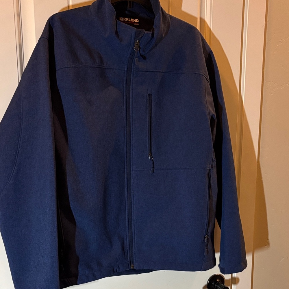 Kirkland zip up jacket.